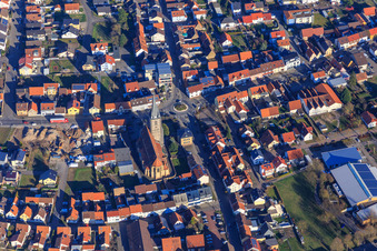 Main Street, St. Remigius and Lußhardthalle from the west in Hambrücken in the state Baden-Wuerttemberg, Germany