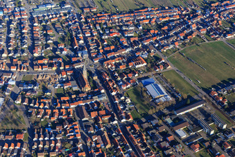 Kirchstraße x Hauptstraße, St. Remigius and Lußhardthalle from the west in Hambrücken in the state Baden-Wuerttemberg, Germany