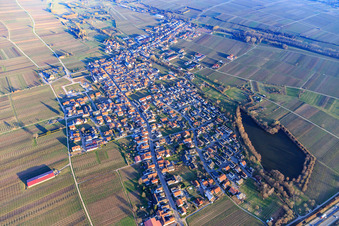 Overview of the town with Schloßweier on the A65 from the west in Kirrweiler in the state Rhineland-Palatinate, Germany