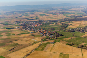 Village - view on the edge of agricultural fields and farmland in Hoffen in Grand Est, France