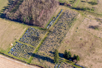 Grave rows on the grounds of the cemetery in Ettendorf in Grand Est, France seen from above