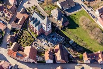 Aerial view of Protestantic Church building in the village of in Schwindratzheim in Grand Est, France