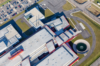 Oblique view of Building and production halls on the premises of SEW-USOCOME usine de Brumath in Bernolsheim in Grand Est, France