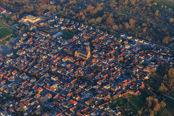 View of the town with the Catholic Church of Mary Queen of Angels and the Sibylla Senior Citizens' Home in Muggensturm in the state Baden-Wuerttemberg, Germany