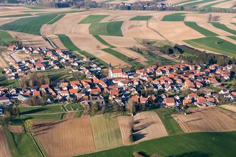 Village - view on the edge of agricultural fields and farmland in Aschbach in Grand Est, France