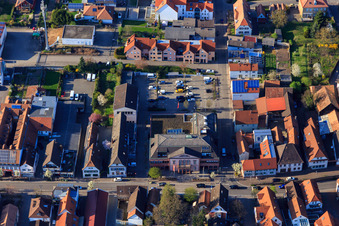 Upper Main Street with the town hall of Herxheim and the Herxheim Family Office in Herxheim bei Landau in the state Rhineland-Palatinate, Germany
