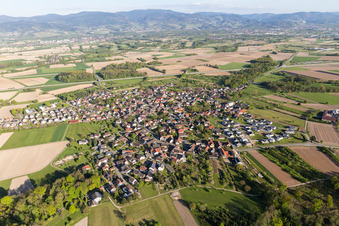 Aerial view of Village - view on the edge of agricultural fields and farmland in Unzhurst in the state Baden-Wurttemberg, Germany
