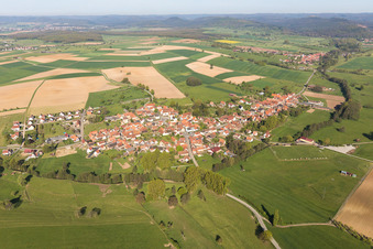 Village - view on the edge of agricultural fields and farmland in Mulhausen in Grand Est, France