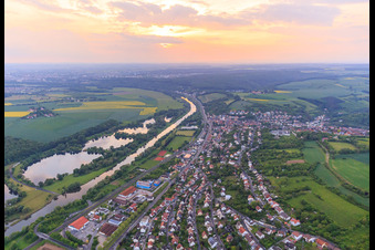 View of the town on the banks of the Main from the southeast in Schonungen in the state Bavaria, Germany