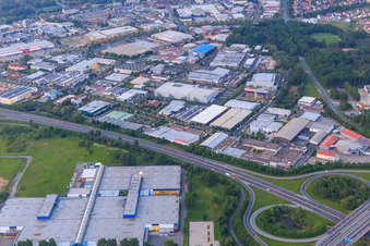 Hafen-Ost industrial area (Friedrich-Rätzer-Straße and Silbersteinstraße) in the evening with MediaMarkt Schweinfurt, Kunststofftechnik Ros GmbH & Co. KG and MAINCOR Rohrsysteme GmbH & Co. KG in Schweinfurt in the state Bavaria, Germany