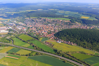 Village view beyond the A70 from the southeast in the district Gleisenau in Ebelsbach in the state Bavaria, Germany