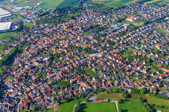 View of the town south of the Main from the north with Dreiberg School Knetzgau and AWO Senior Citizens' Center Knetzgau and church of the parish community Knetzgau in Knetzgau in the state Bavaria, Germany