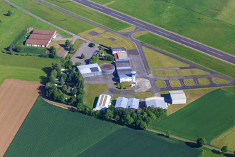 Aerial view of Tower and hangar at the commercial airfield Haßfurt-Haßberge GmbH in the district Kleinaugsfeld in Haßfurt in the state Bavaria, Germany