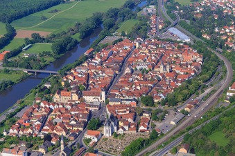 Aerial view of Upper suburb and main street with town hall, town hall Haßfurt, knight's chapel at the cemetery and hospital chapel Holy Spirit in Haßfurt in the state Bavaria, Germany