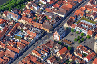 Brückenstraße and Old Town Hall Haßfurt on the market square with market fountain in Haßfurt in the state Bavaria, Germany