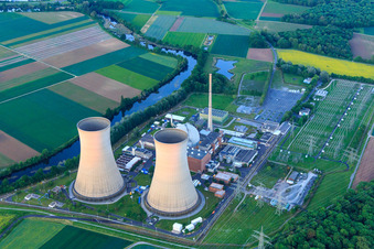 Preussenelektra GmbH — Nuclear power plant Grafenrheinfeld on the Main at sunset in Grafenrheinfeld in the state Bavaria, Germany from the plane