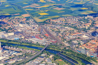 Station area across the Main from the east with Schaeffler Aerospace Germany GmbH & Co. KG in Schweinfurt in the state Bavaria, Germany