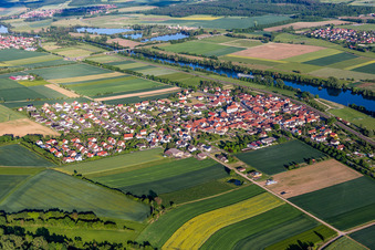 Oblique view of Village on the river bank areas of the Main river in Untertheres in the state Bavaria, Germany
