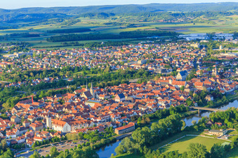 Aerial view of City overview of the old town beyond the Main from the west in Haßfurt in the state Bavaria, Germany