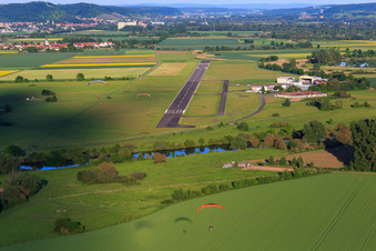 Aerial view of Runway of the commercial airfield Haßfurt-Haßberge GmbH in the district Mariaburghausen in Haßfurt in the state Bavaria, Germany