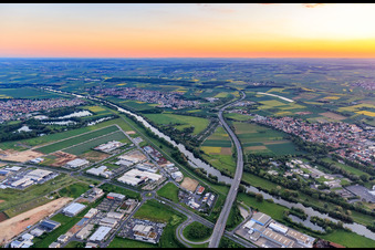Junction Schweinfurt-Hafen and A70 motorway bridge over the Main in the evening from the east in the district Oberndorf in Schweinfurt in the state Bavaria, Germany