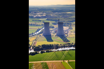 Cooling towers and high-voltage lines to the nuclear power plant Grafenrheinfeld of Preussenelektra GmbH on the Main river bank from the west in Grafenrheinfeld in the state Bavaria, Germany from above