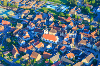 Village center with St. Burkhard Church in Geiselwind in the state Bavaria, Germany