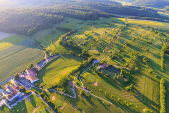 Oblique view of Golf course Geiselwind of the Steigerwald Golf Club e. V. with house on the lake in Geiselwind in the state Bavaria, Germany
