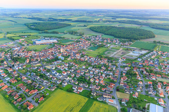 Aerial view of Overview of the town from the northeast in Grettstadt in the state Bavaria, Germany