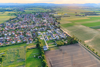 Village view in the evening from the east in Minfeld in the state Rhineland-Palatinate, Germany