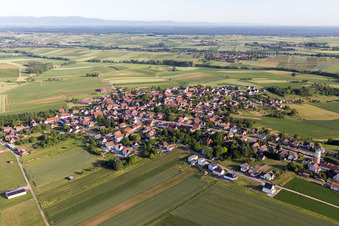 Village - view on the edge of agricultural fields and farmland in Schoenenbourg in Grand Est, France