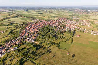 Village - view on the edge of agricultural fields and farmland in Surbourg in Grand Est, France