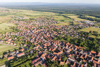 Aerial view of Village - view on the edge of agricultural fields and farmland in Surbourg in Grand Est, France