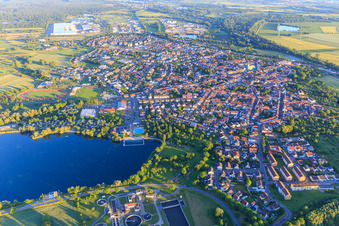 Aerial view of City view from the north in the evening behind the Freyersee in Philippsburg in the state Baden-Wuerttemberg, Germany