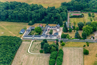Building and castle park systems of water castle Chateau de Combreux in Combreux in Centre-Val de Loire, France from above