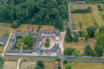 Building and castle park systems of water castle Chateau de Combreux in Combreux in Centre-Val de Loire, France from the plane