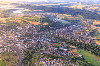 View from the northwest in the morning with the red and white mast of the Südwestrundfunk transmitter Mühlacker, the city's landmark in Mühlacker in the state Baden-Wuerttemberg, Germany