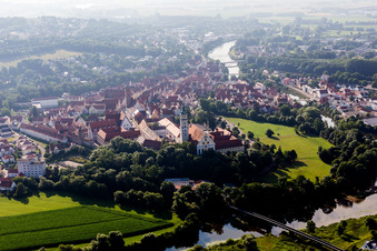Complex of buildings of the monastery Heilig Kreuz in front of Ried island in Donauwoerth in the state Bavaria, Germany