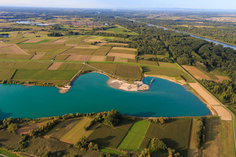 Aerial view of Polder dam behind the Rheinzabern quarry lake in Neupotz in the state Rhineland-Palatinate, Germany