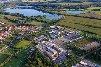 Industrial park with Schneider Betonfertigteilewerk GmbH and In d. Kühweid with Ledo Plus, Kail Interfood GmbH and KHW World Wide GmbH in the district Huttenheim in Philippsburg in the state Baden-Wuerttemberg, Germany