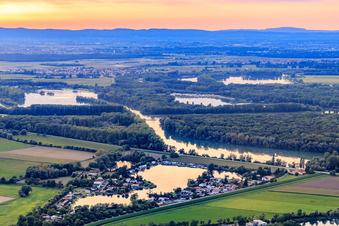 Lake and bathing beach Hohwiese of the Seegemeinschaft Ketsch eV in the evening light in Ketsch in the state Baden-Wuerttemberg, Germany