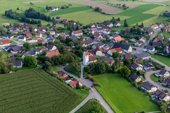 Aerial view of Village - view on the edge of agricultural fields and farmland in Sentenhart in the state Baden-Wurttemberg, Germany