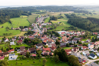 Aerial view of Village - view on the edge of agricultural fields and farmland in Zoznegg in the state Baden-Wurttemberg, Germany