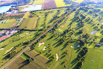 Railway line cuts through the golf course of Golf-Club Bensheim eV in Bensheim in the state Hesse, Germany