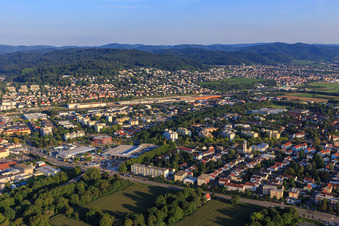 City view on the edge of the Odenwald from the northwest with Mannheime Straße and REWE Center Markus Mauz in Weinheim in the state Baden-Wuerttemberg, Germany