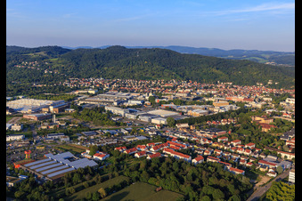 City view on the edge of the Odenwald from the southwest with Freudenberg Sealing Technologies in Weinheim in the state Baden-Wuerttemberg, Germany