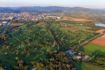 Railway line cuts through the golf course of Golf-Club Bensheim eV in Bensheim in the state Hesse, Germany from above