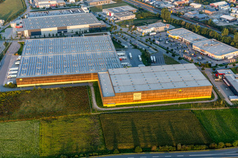 Oblique view of Building complex and grounds of the logistics center of Verteilzentrums von Alnatura in Lorsch in the state Hesse, Germany