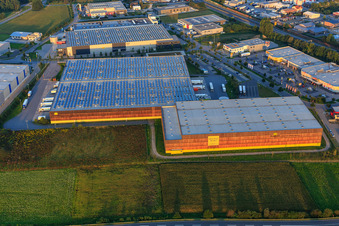 Oblique view of Alnatura distribution center with wooden facade in Lorsch in the state Hesse, Germany