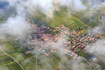 Wine village view under clouds from the southeast in Birkweiler in the state Rhineland-Palatinate, Germany